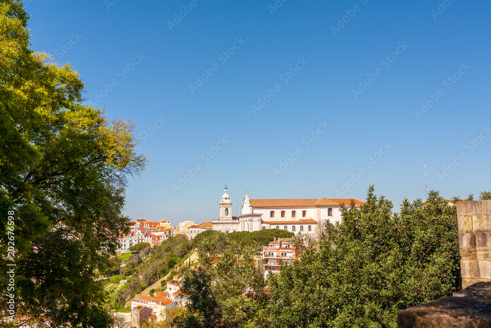 Old Lisbon Portugal panorama. cityscape with roofs. miraduro viewpoint. sao jorge castle