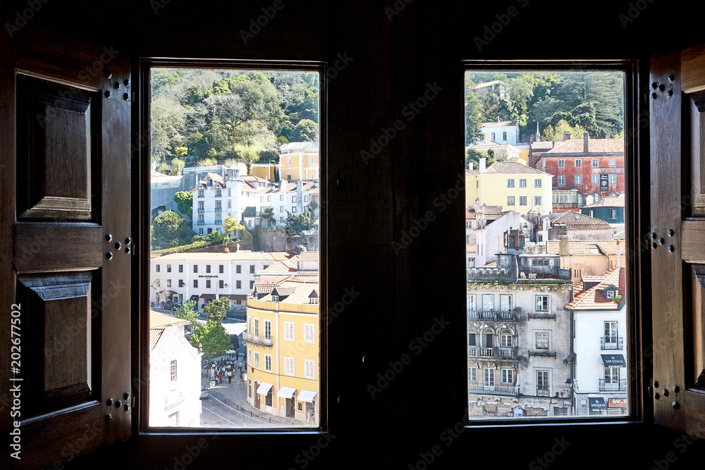 Worms eye view of the impressive Palace da Pena over the hill in Sintra, Lisbon. Portugal. Window view Worms eye view of the impressive Palace da Pena over the hill in Sintra, Lisbon. Portugal. Window view