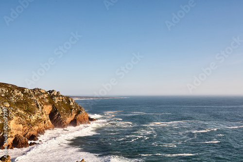 Exploring Portugal. Cabo da Roca ocean and mountains view landscape, authentic capture, wanderlust concept.