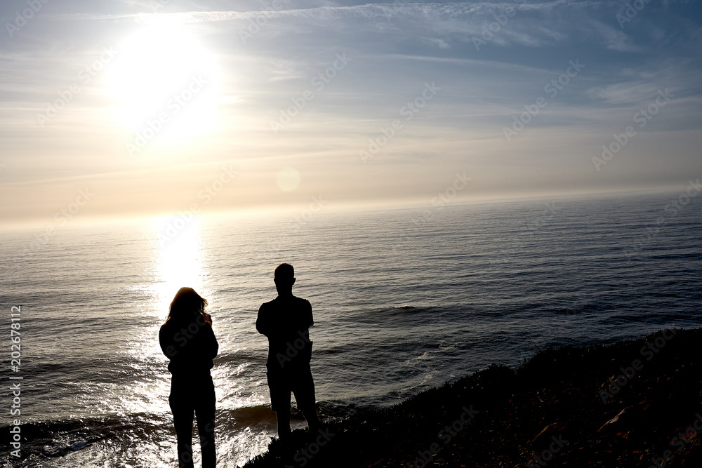 Exploring Portugal. Cabo da Roca ocean and mountains view landscape, authentic capture, wanderlust concept. sunset silhouettes