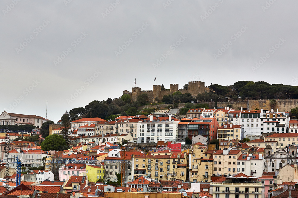 Old Lisbon Portugal panorama. cityscape with roofs. Tagus river. miraduro viewpoint