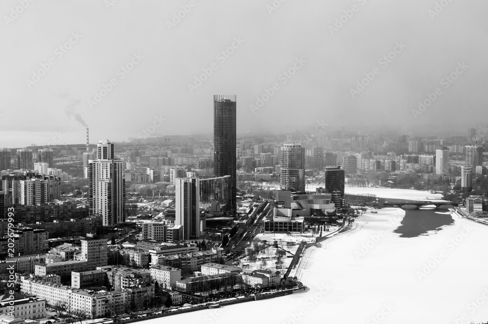 A view over the center of Yekaterinburg, Russia, in winter, with skyscrapers. Black and white