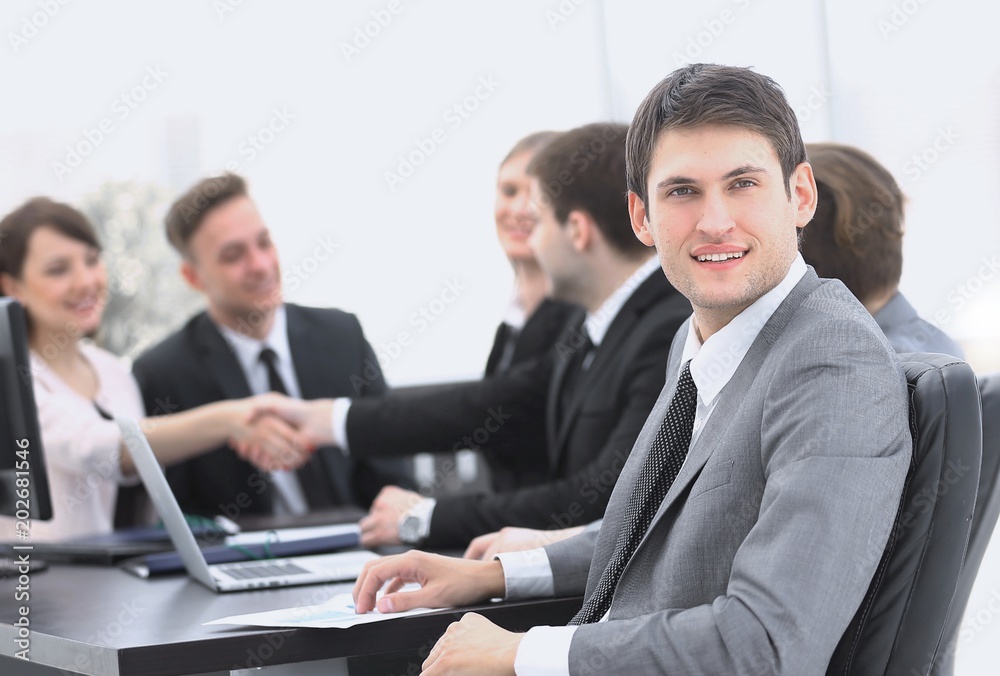lawyer on the background of business partners handshaking lawyer on the background of business partners handshaking