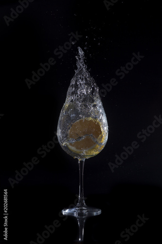 lemon drop into water