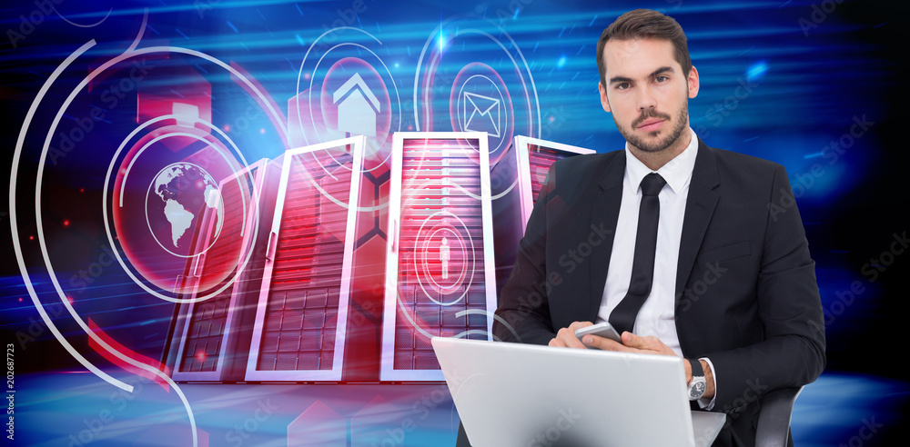 Cheerful businessman with laptop using smartphone against composite image of server towers Cheerful businessman with laptop using smartphone against composite image of server towers