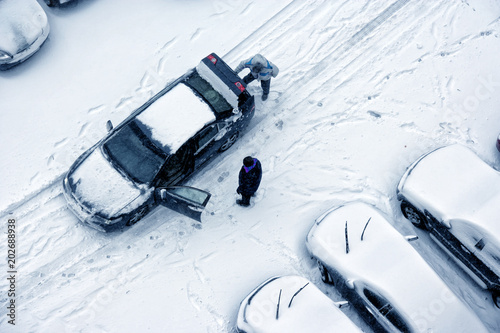 cars covered with snow