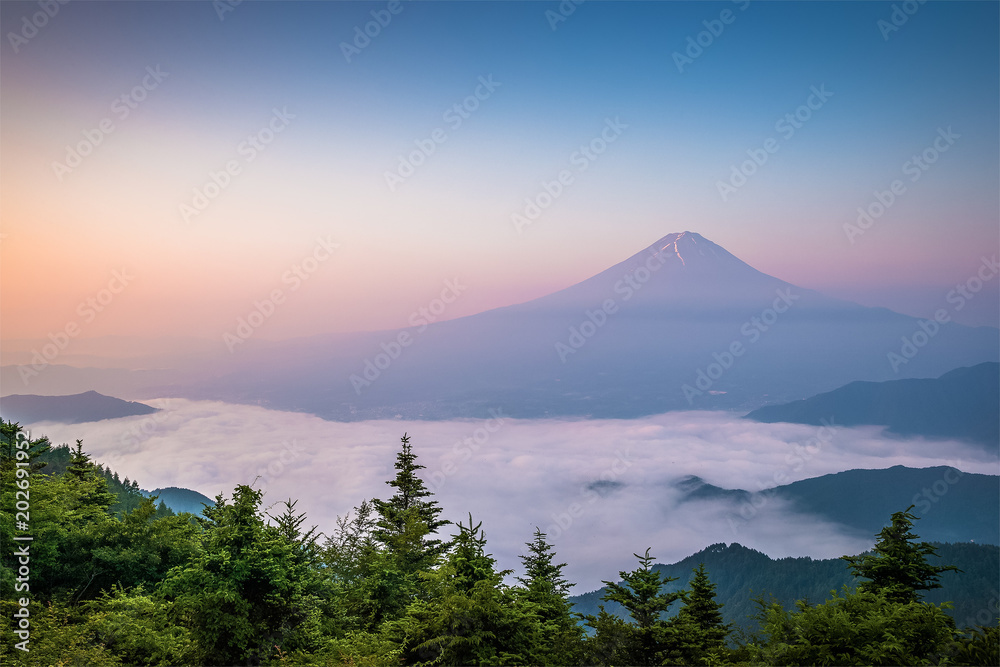 Mt.Fuji with sea of mist above Kawaguchiko lake in summer