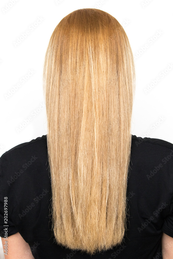 Naklejka premium Beautiful blonde long hair from behind