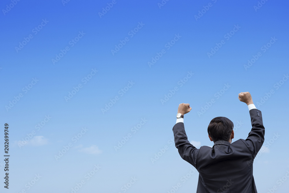 success business man enjoying with blue sky background success business man enjoying with blue sky background