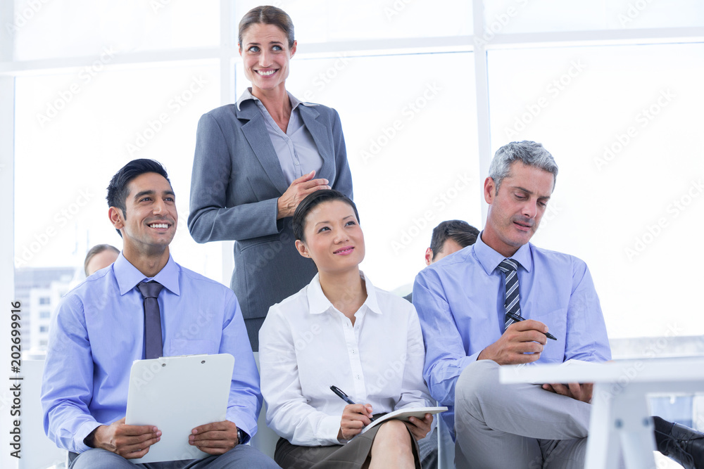 business team taking a note during a meeting business team taking a note during a meeting
