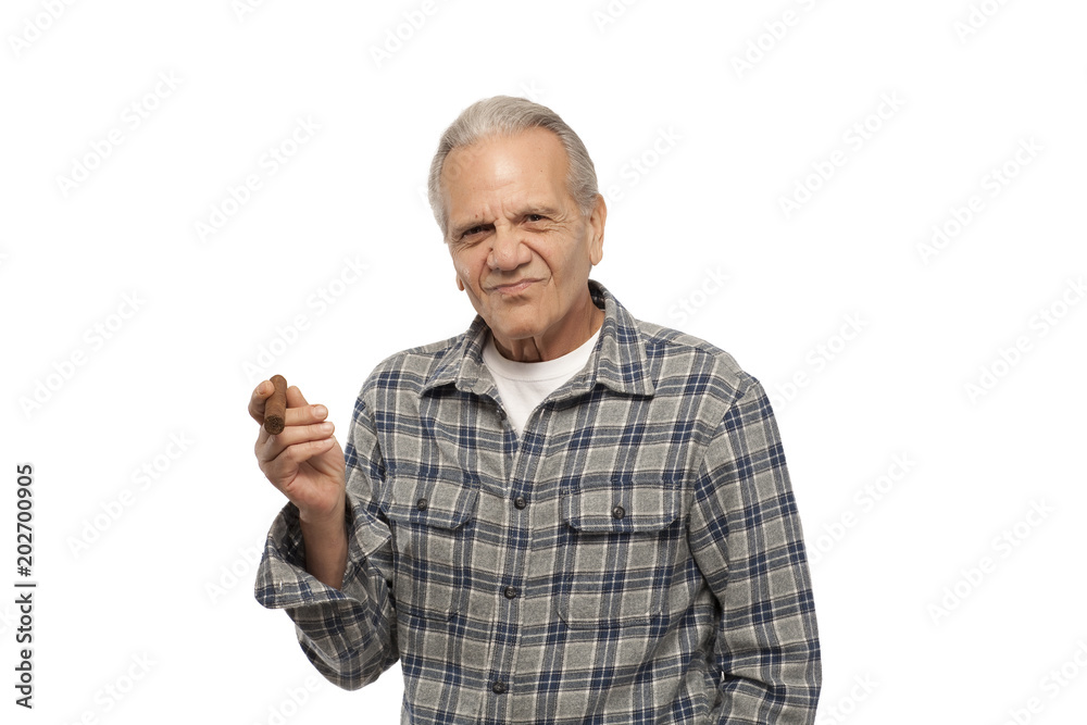 Fototapeta premium Senior man holding cigar