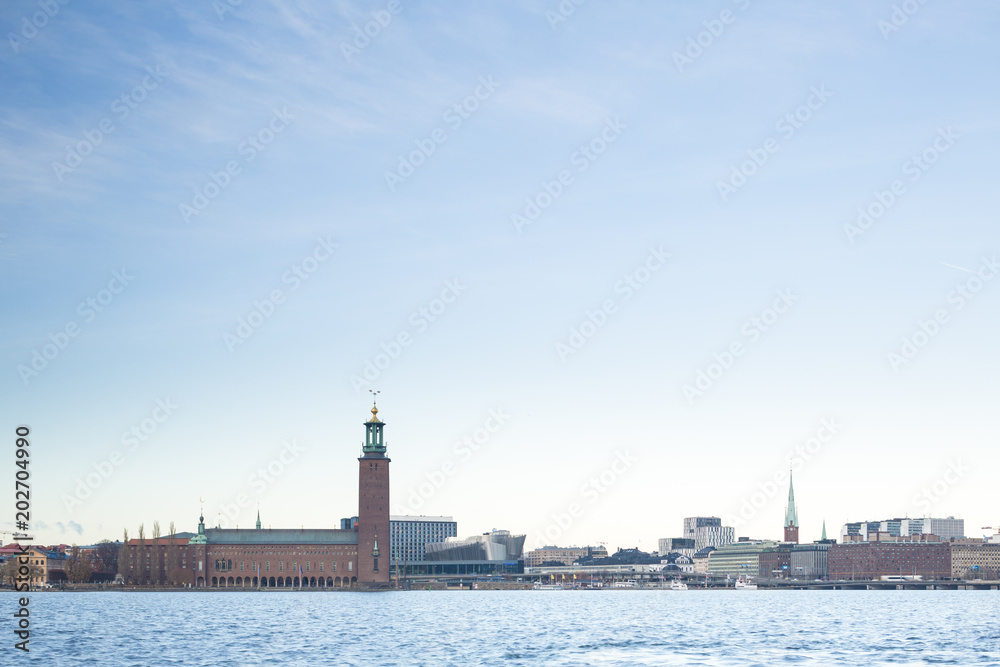 Beautiful scenic panorama of the Old City (Gamla Stan) cityscape pier architecture with historic town houses with colored facade in Stockholm, Sweden. Creative landscape photography