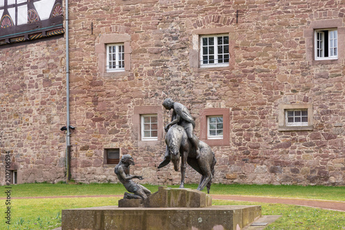 Statue St. Martin Mantelteilung an der Burg Blomberg, Nordrhein-Westfalen photo