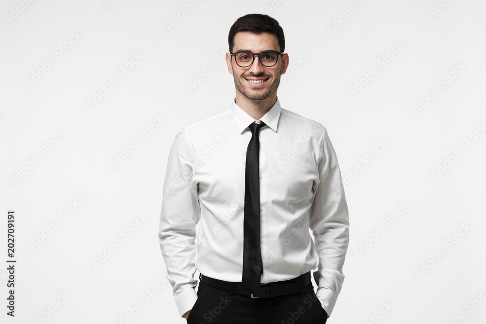Half-length portrait of young European Caucasian man pictured isolated ...
