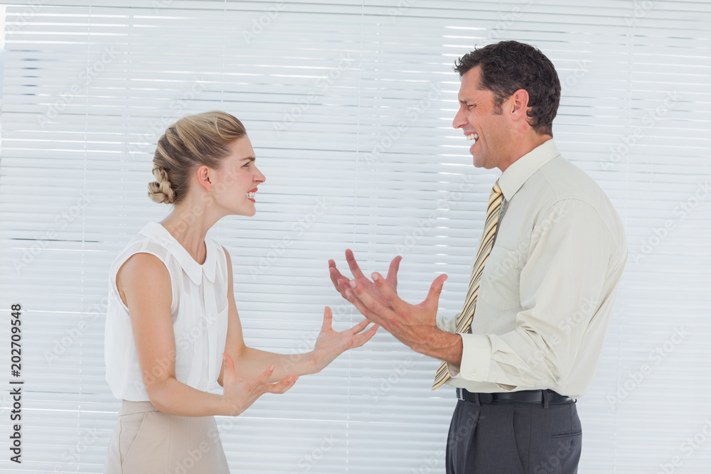 Angry business team having heated argument Angry business team having heated argument