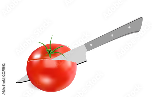 The knife cuts a tomato