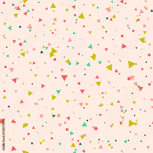 Abstract seamless pattern with colorful green, red, yellow chaotic small circles and triangles on pink. Infinity geometric pattern. Vector illustration. 