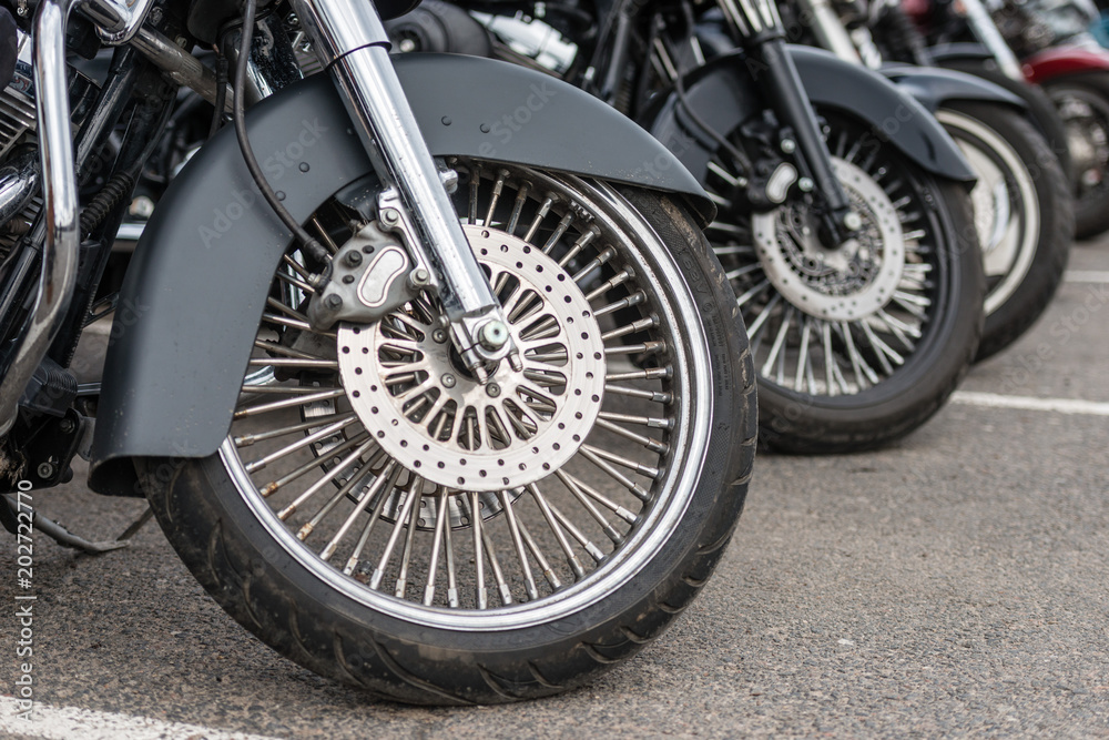 Obraz premium RIGA, LATVIA - APRIL 28, 2018: 2018 Moto Season Opening Event. A close-up of the most interesting details and attributes of motorcycles parked at the parade.