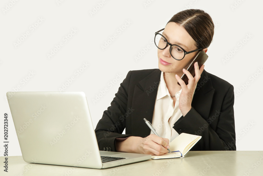 Too busy - beautiful young woman sitting at office desk Too busy - beautiful young woman sitting at office desk