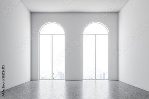 White empty room interior with two arched windows