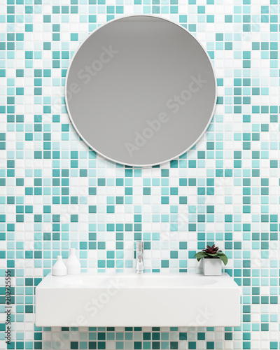 Green tiles bathroom with a sink close up photo