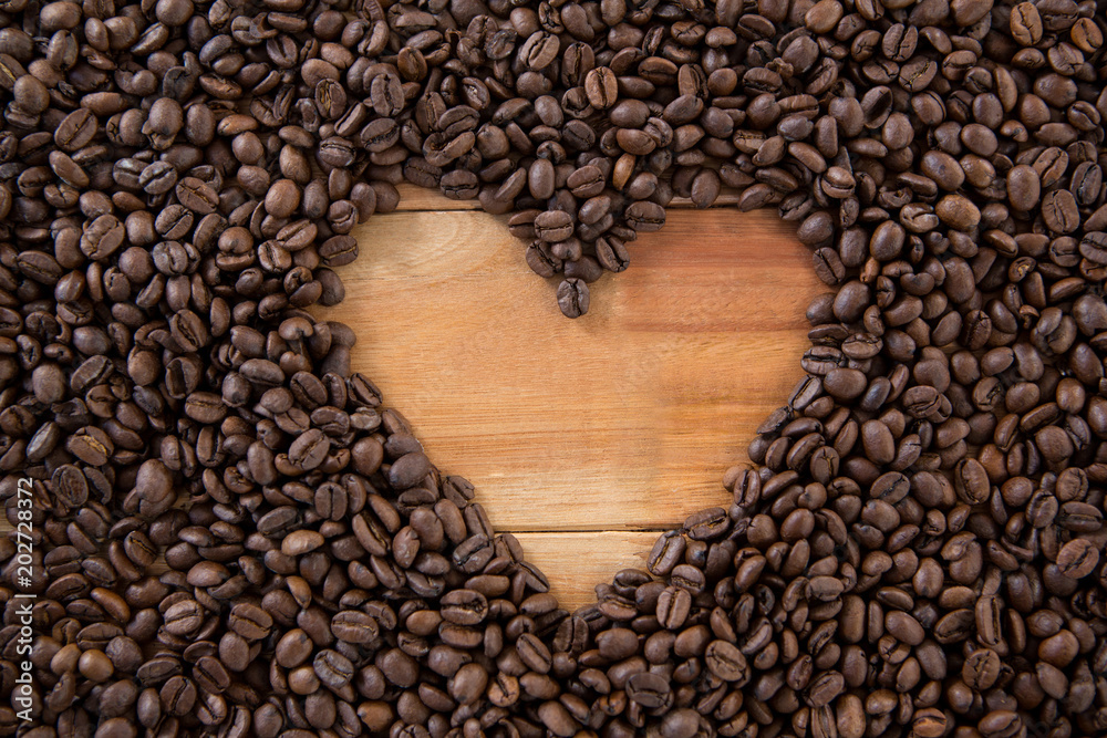 Coffee beans forming heart shape Coffee beans forming heart shape
