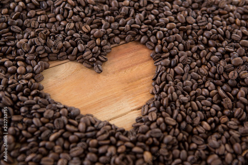 Coffee beans forming heart shape Coffee beans forming heart shape