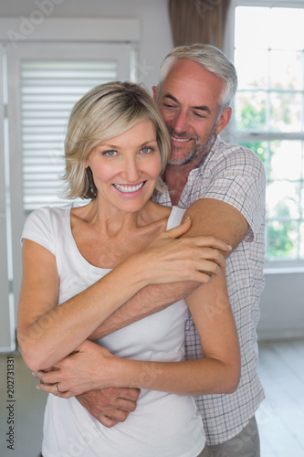 Mature man embracing smiling woman © WavebreakmediaMicro