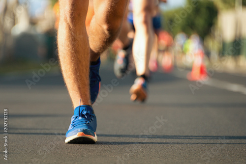 Marathon running in the light of evening,detail of sports shoes