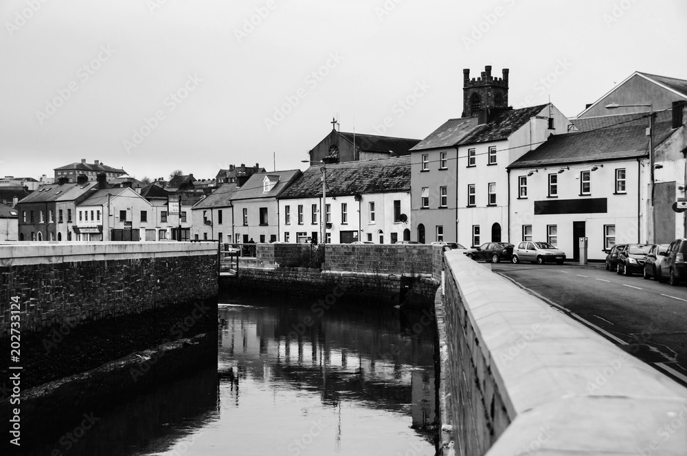 Cityscape during the day in Waterford, Ireland. It is the oldest city in the country. Black and white