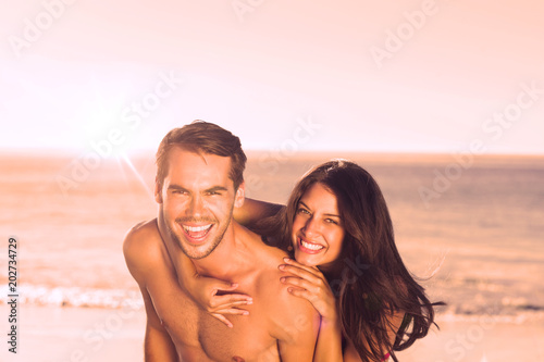 Young couple having fun at the beach © vectorfusionart