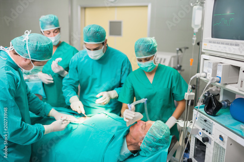 Medical team operating