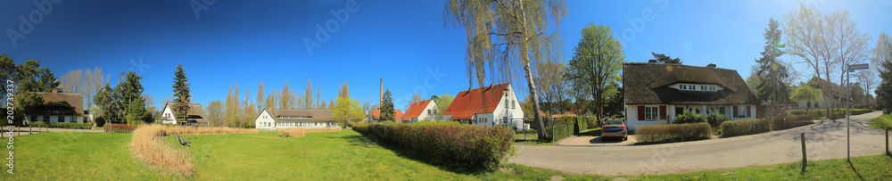 Panoramic image of historic group of houses, listed as monuments in Riems near Greifswald