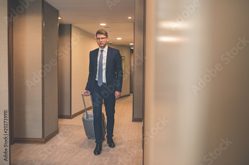 Young businessman in the hall