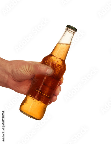 butelka piwa w ręku