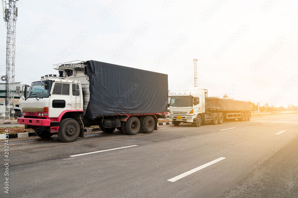 trucks Logistic by Cargo truck Import Export business and Industrial on the road . 