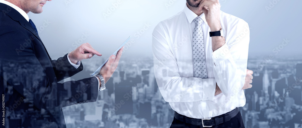 Φωτογραφία Portrait of a businessman with glasses thinking  against high angle view of city