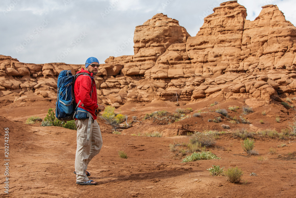 Hiker in Kodachrome Basin state park in Utah, USA Hiker in Kodachrome Basin state park in Utah, USA