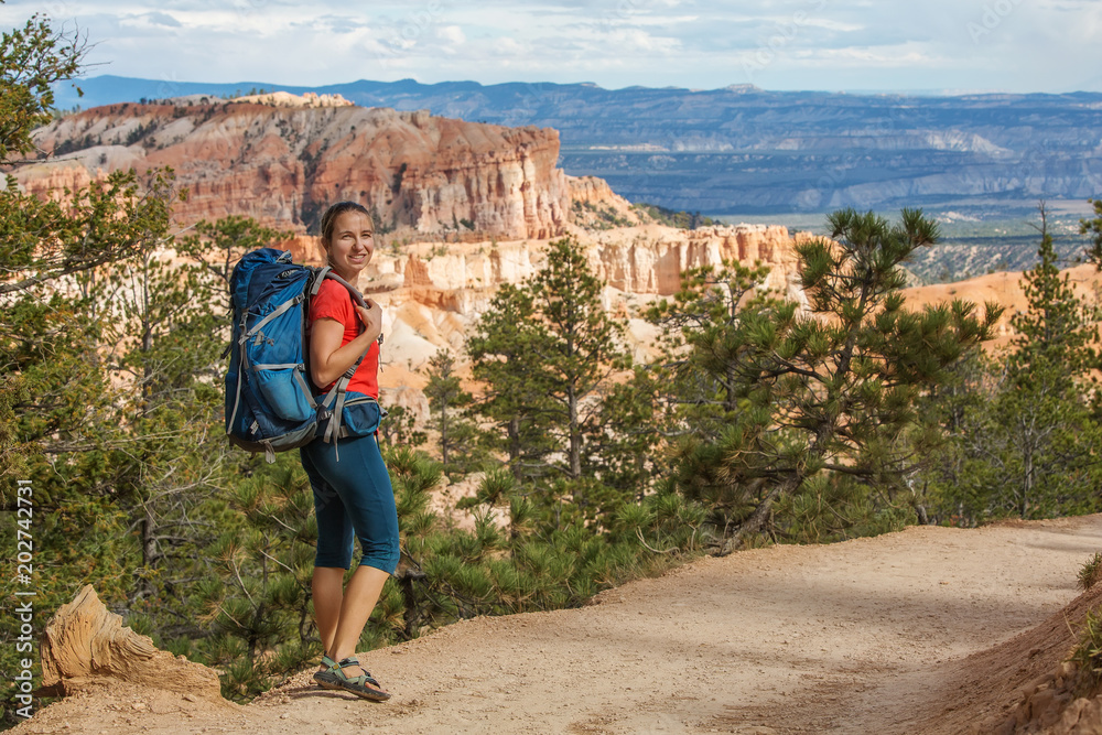 Naklejka premium Hiker visits Bryce canyon National park in Utah, USA