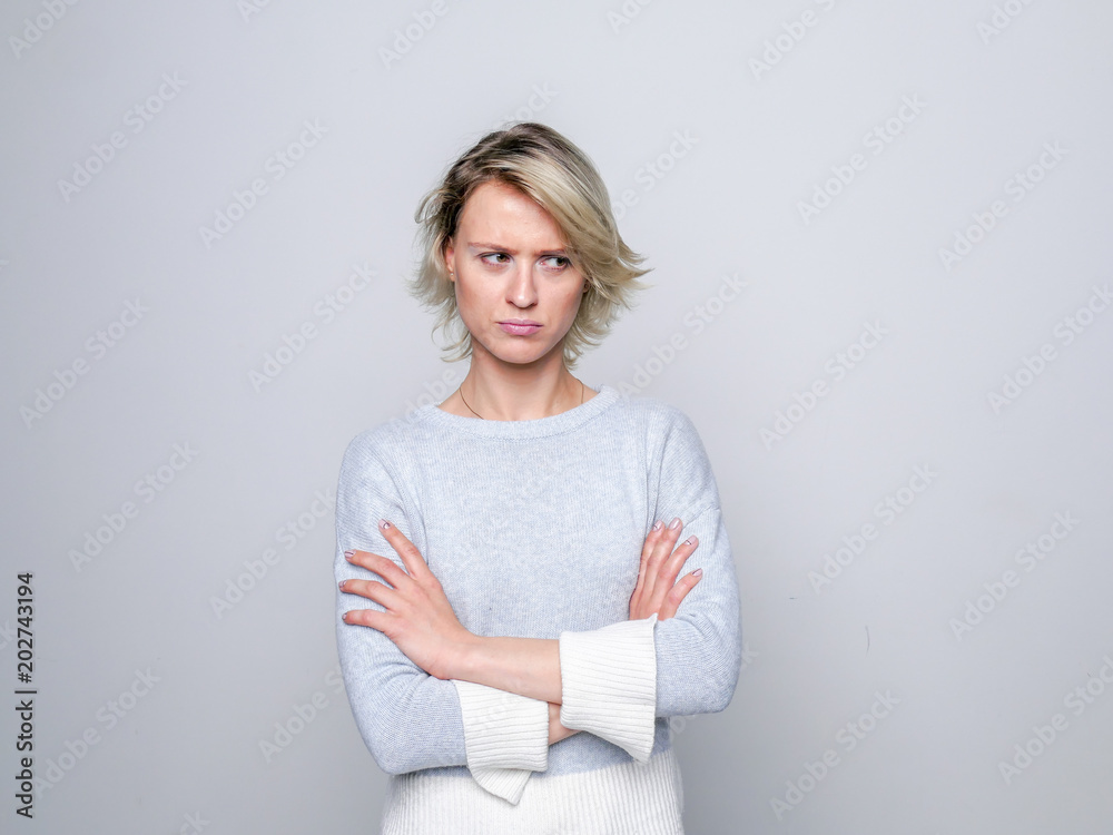 Adult sad woman posing in studio. Negative emotions.. Adult sad woman posing in studio. Negative emotions..