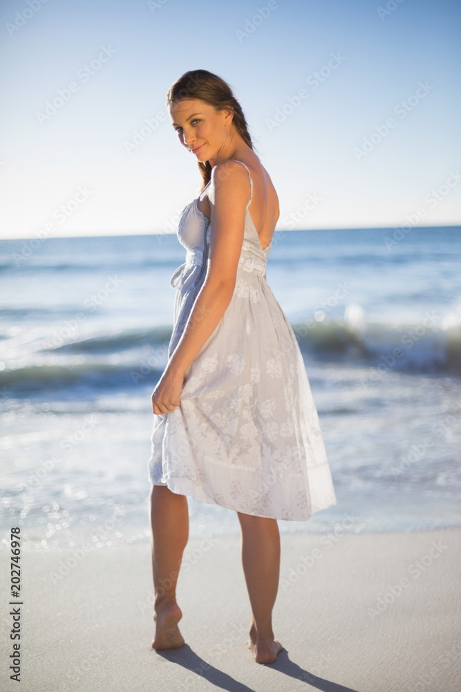 Peaceful attractive woman looking over shoulder at camera Peaceful attractive woman looking over shoulder at camera
