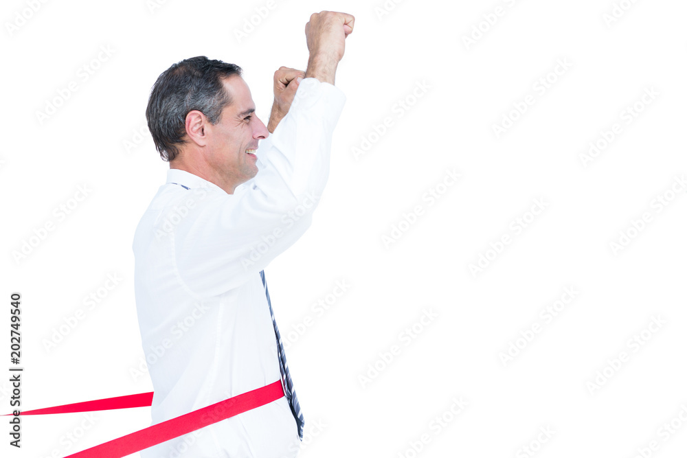 Happy businessman cutting red ribbon Happy businessman cutting red ribbon