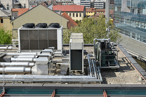 Air conditioners on the top of a building.
