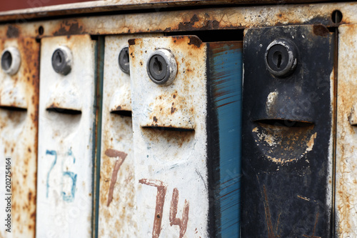 Old rusty mailboxes, like enthusiastic faces waiting for letters
