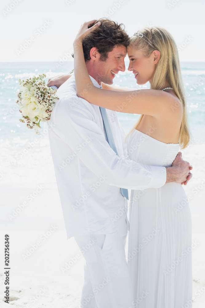 Couple embracing each other on their wedding day