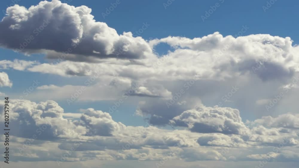 Cumulonimbus cloud on blue sky background, time-lapse Cumulonimbus cloud on blue sky background, time-lapse