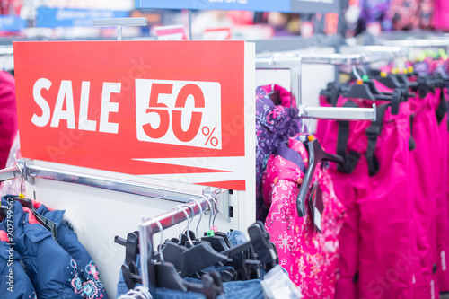 Sale sign in winter clothes shop.shopping and discount concept. Final Sale Sign In A Clothing Store Selective focus.shopping and discount concept. photo