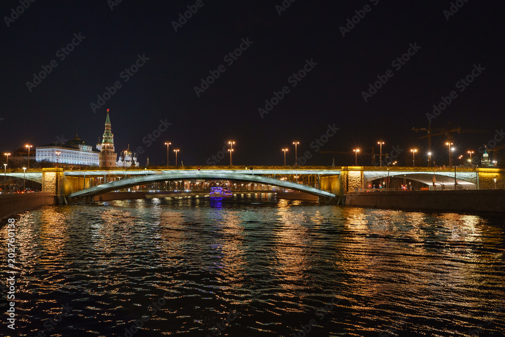Moscow night image. The Kremlin, the Ivan the Great bell tower, the Assumption cathedral, the Arkhangelsk cathedral and the Residence of the President of the Russian Federation are in focus