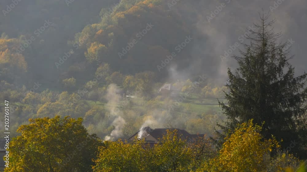 Smoldering chimneys surrounded by nature Smoldering chimneys surrounded by nature