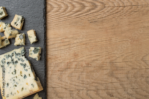 Cheese dor blu, on a wooden texture